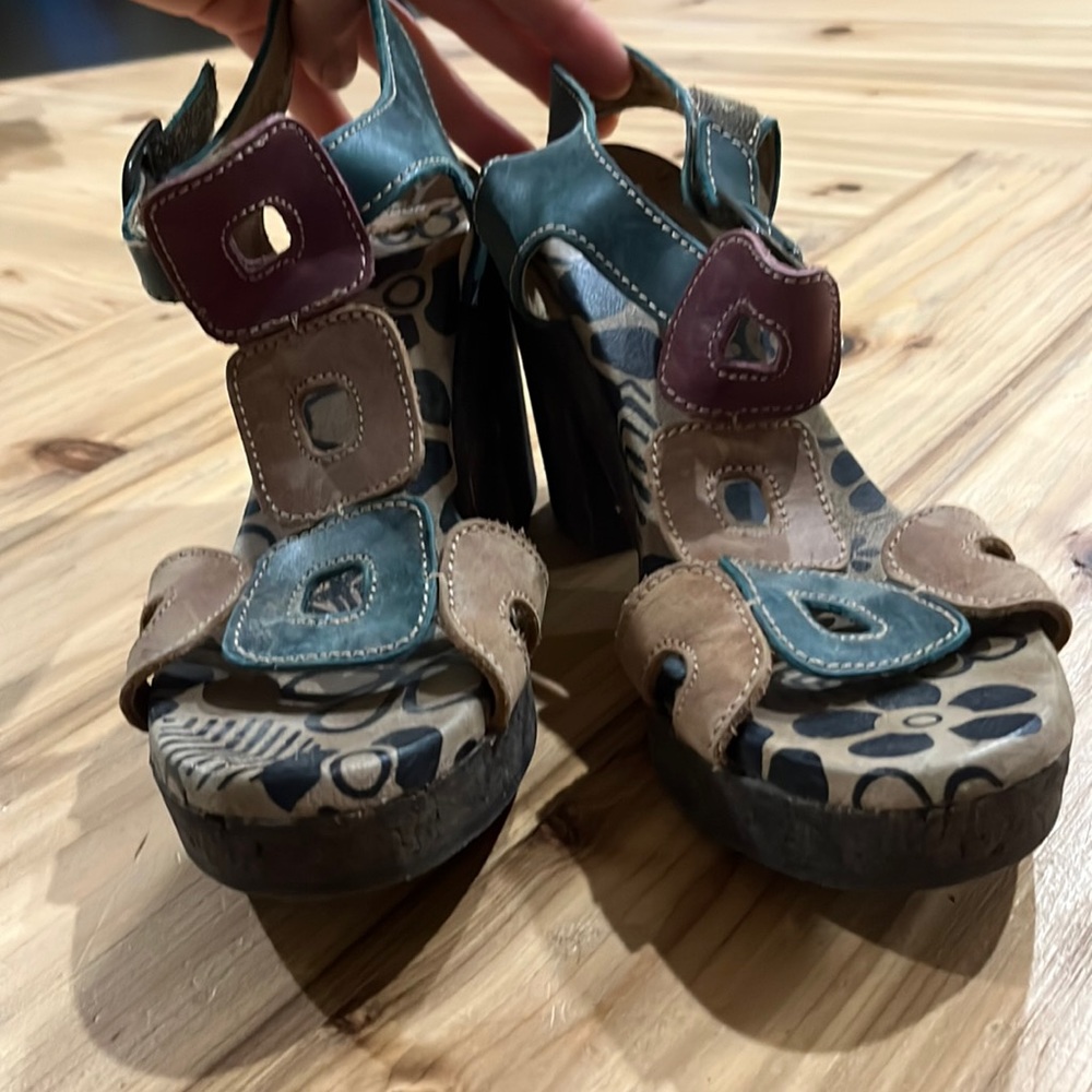 Heeled sandals by fly London.
